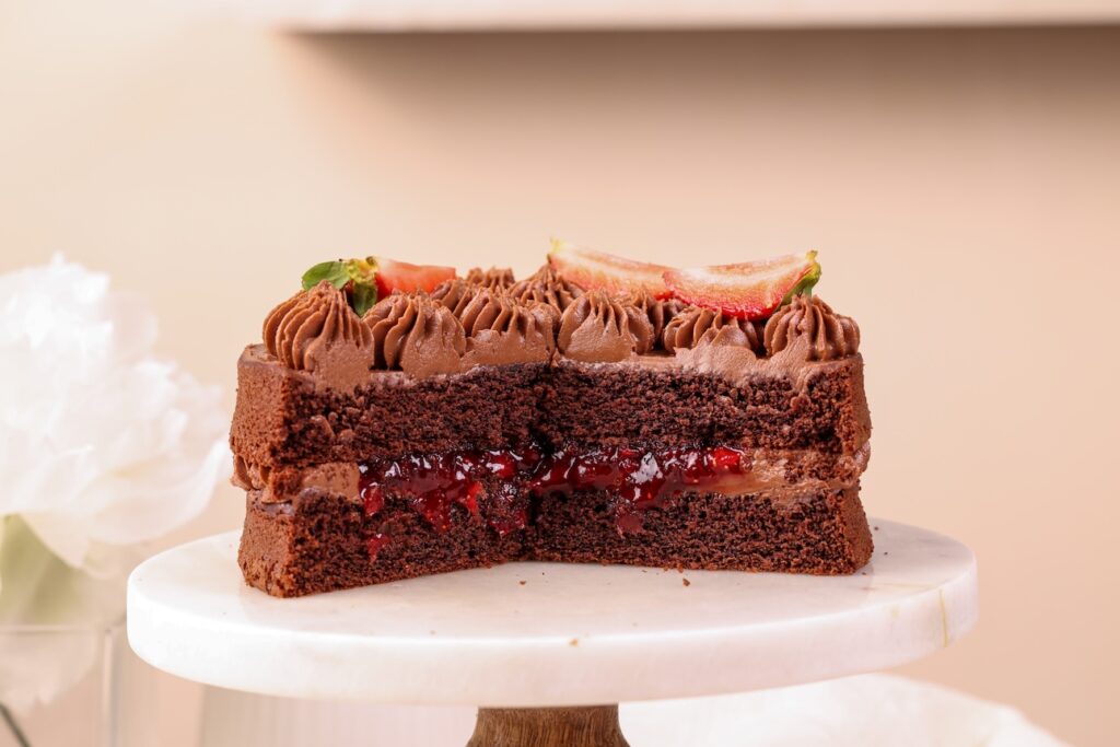 Layers of Eggless Wholewheat Chocolate Strawberry Cake